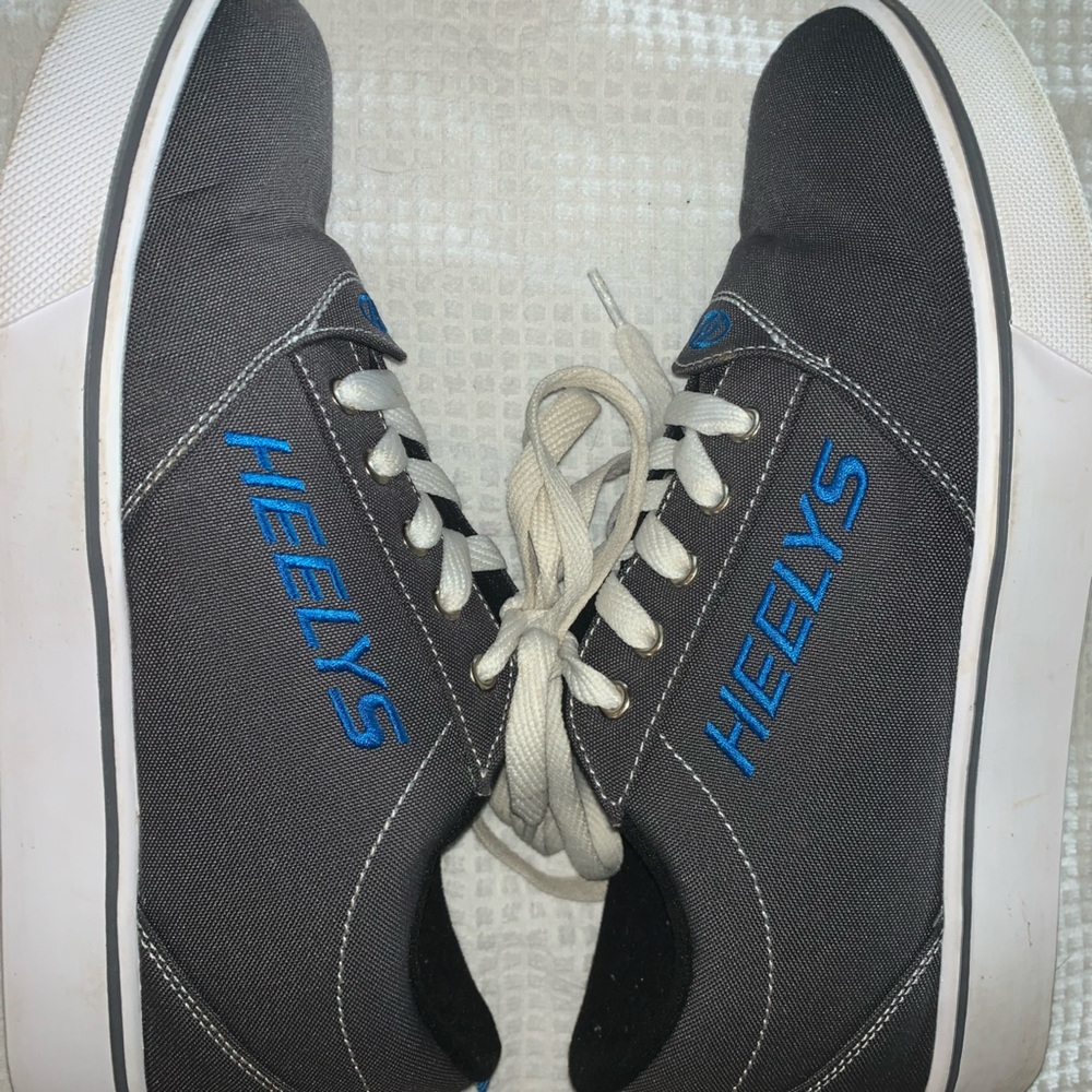 Twice worn Heelys ! Like new; super clean and waiting for some fun.